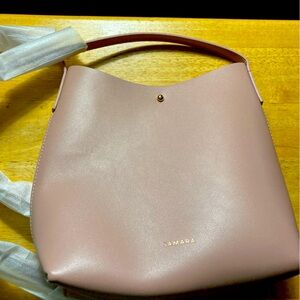 NEW! Pretty pink bucket bag. Button closure